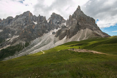 Scenic view of landscape and mountains against sky