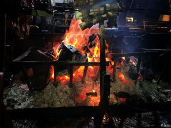 Bonfire on log at night