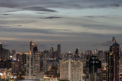 Modern buildings in city against sky