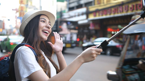 Young woman using mobile phone