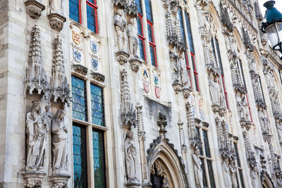 Low angle view of statues on building