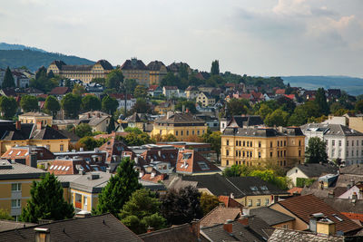 High angle shot of townscape against sky