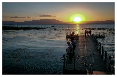 Scenic view of sea at sunset