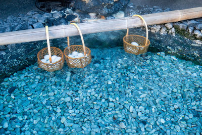 High angle view of ropes hanging on swimming pool