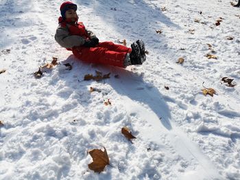 High angle view of child during winter