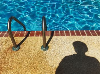 Low section of man in swimming pool