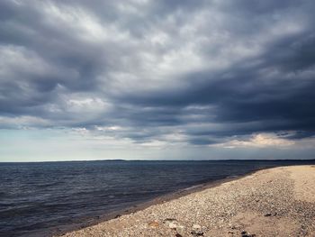 Scenic view of beach against sky