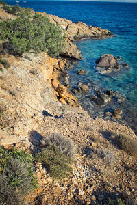 High angle view of rocks on shore