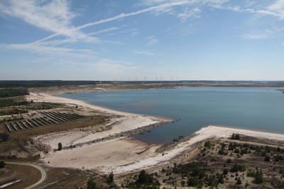 High angle view of sea against blue sky