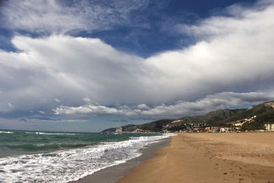 Scenic view of beach against sky