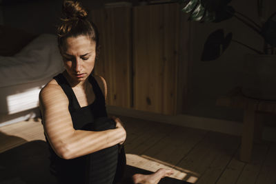 Woman exercising at home