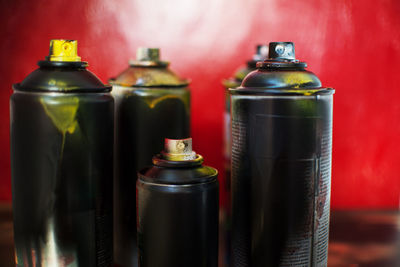 Close-up of wine bottles on table