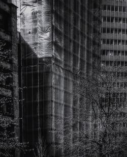 Digital composite image of modern glass building