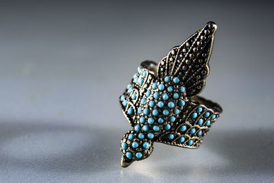 Close-up of butterfly on table
