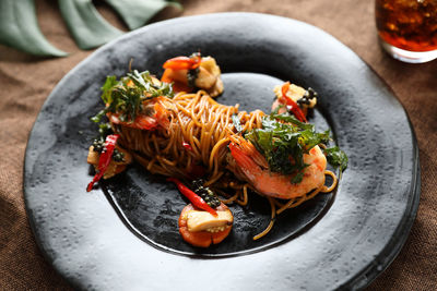 High angle view of vegetables in plate on table