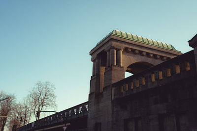 Low angle view of building against clear blue sky