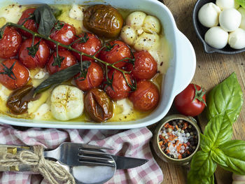 High angle view of fruits in plate on table