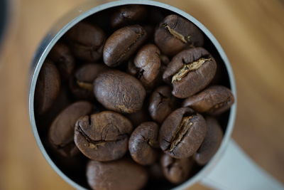 High angle view of coffee beans in bowl