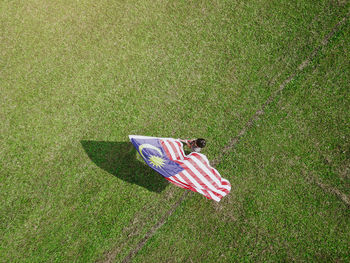 High angle view of flag on field