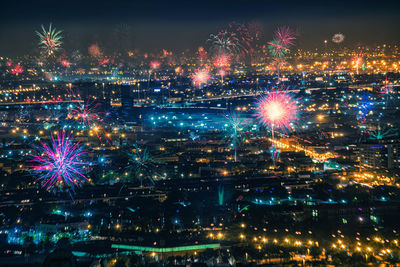 Firework display at night