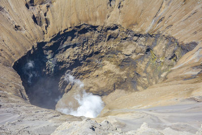 The hole and crater smoke mount bromo, indonesia