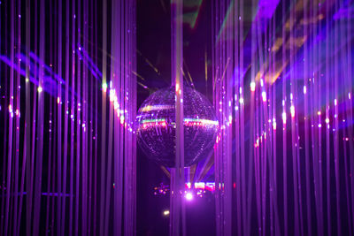 Full frame shot of illuminated lighting equipment at night