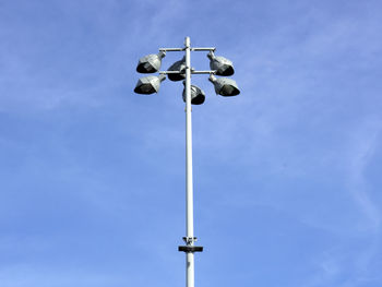 Low angle view of metal pole against sky