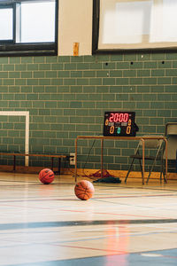 Basketball hoop against wall