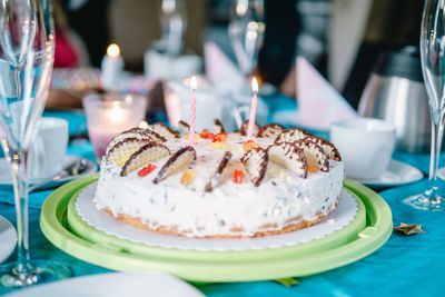 Close-up of cake with bread in plate