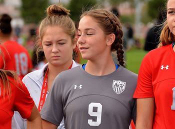 Group of people on soccer field