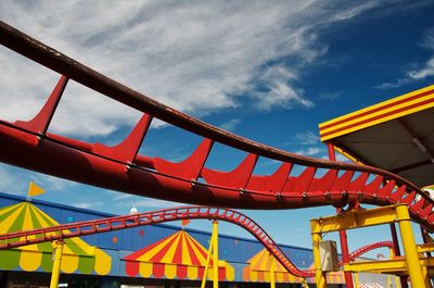 Close-up of roller coaster at amusement park