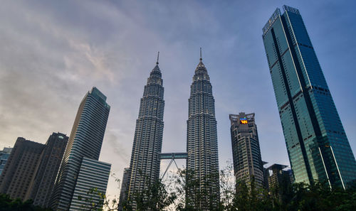 Low angle view of modern buildings against sky