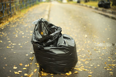 High angle view of garbage bin on street