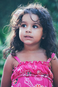 Portrait of cute girl looking away