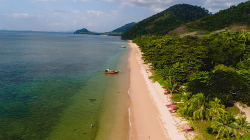 Scenic view of beach against sky