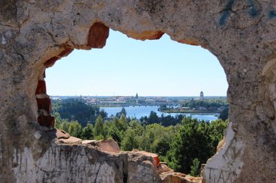 View of sea through window