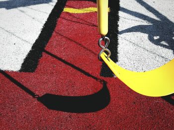 High angle view of yellow shadow on floor