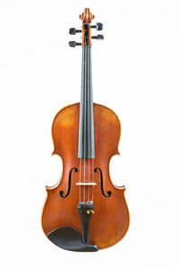 Close-up of electric lamp against white background