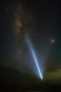 Scenic view of star field against sky at night