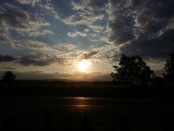 Scenic view of silhouette landscape against sky during sunset