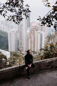 Lifestyle portrait of chinese guy in hong kong.