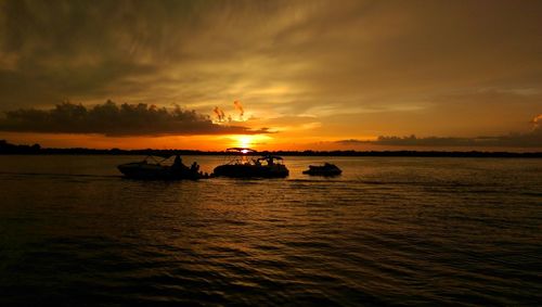 Scenic view of sea at sunset