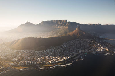 High angle shot of town against mountains