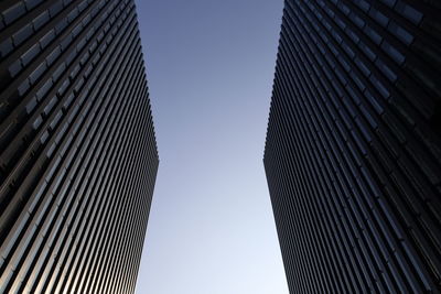 Low angle view of modern buildings against clear sky