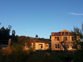 Low angle view of buildings against clear sky