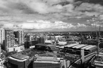 High angle view of buildings in city against sky