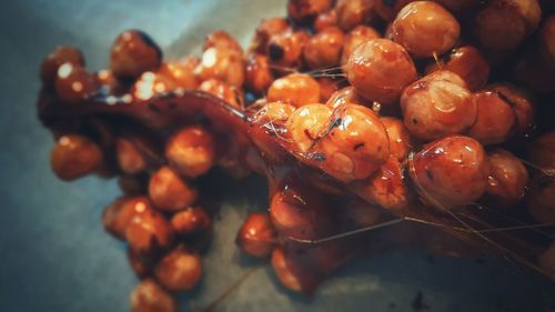 Close-up of hazelnuts in plate at home