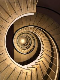 Low angle view of spiral staircase in building