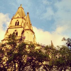 Low angle view of church against sky