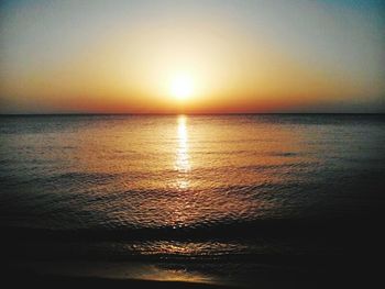 Scenic view of sunset over sea